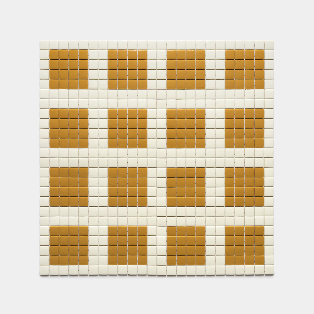 Ells Milk + Rye by Zia Tile features a white grid with cream squares and a center of four rows by five columns of brown squares, forming a checkerboard pattern perfect for modern spaces.