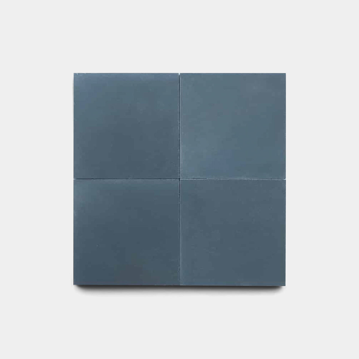 Four Empire Blue 4x4 cement tiles by vendor-unknown, matte finish, arranged in a 2x2 grid on a plain light gray background.