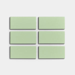 Six Eucalyptus 2x4 mint green matte ceramic tiles by Zia Tile are arranged in two rows of three on a plain white background, ideal for indoor or outdoor installations.