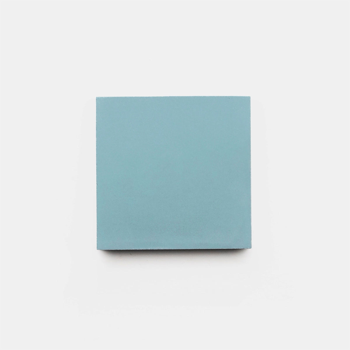 A single square blue sticky note is centered on a plain white background, reminiscent of the clean lines and bold color of vendor-unknown's Everest 4x4, Sample tile.