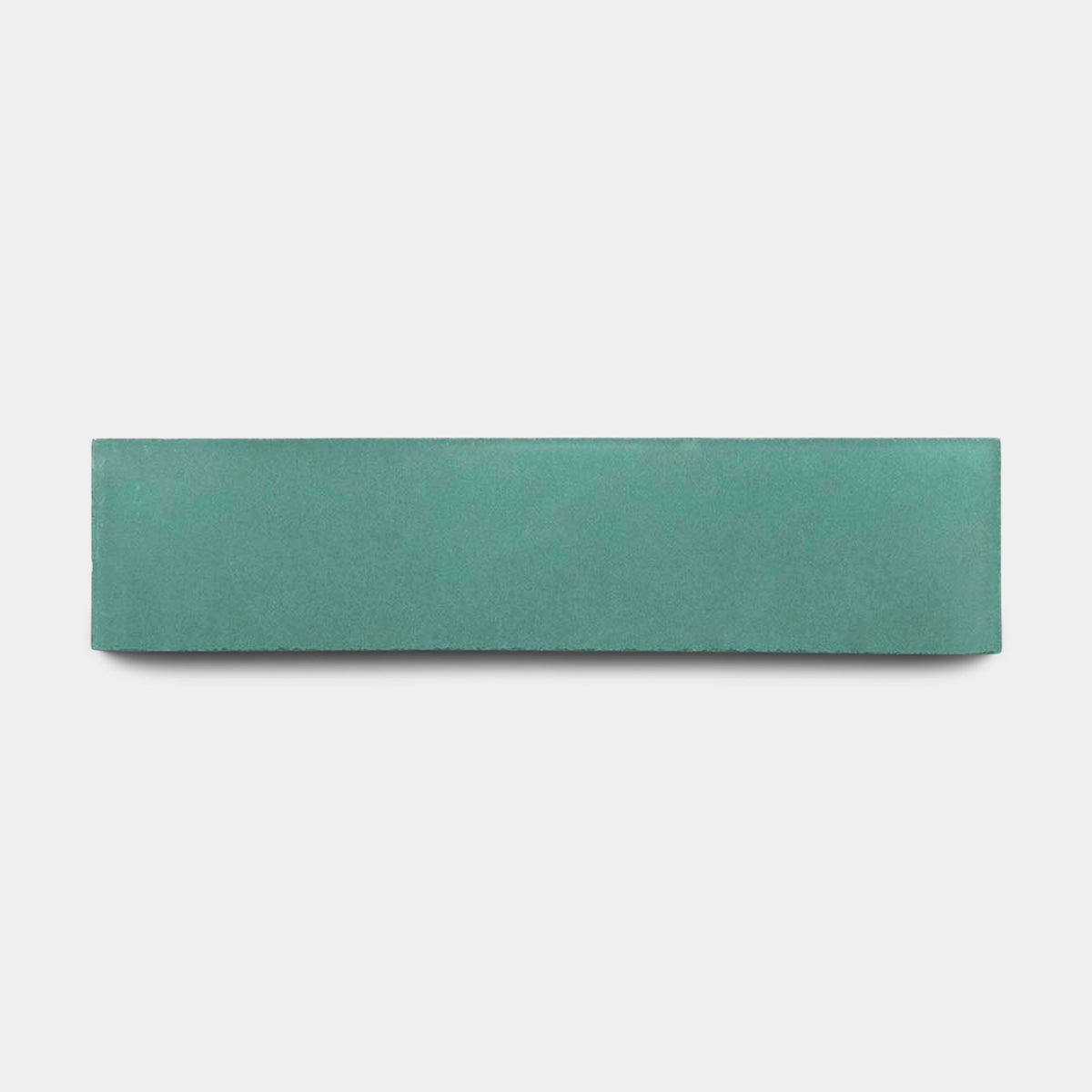 A rectangular Everglade 2x8 sample tile by vendor-unknown, in teal, is centered on a plain white background, evoking the smooth look of ceramic.
