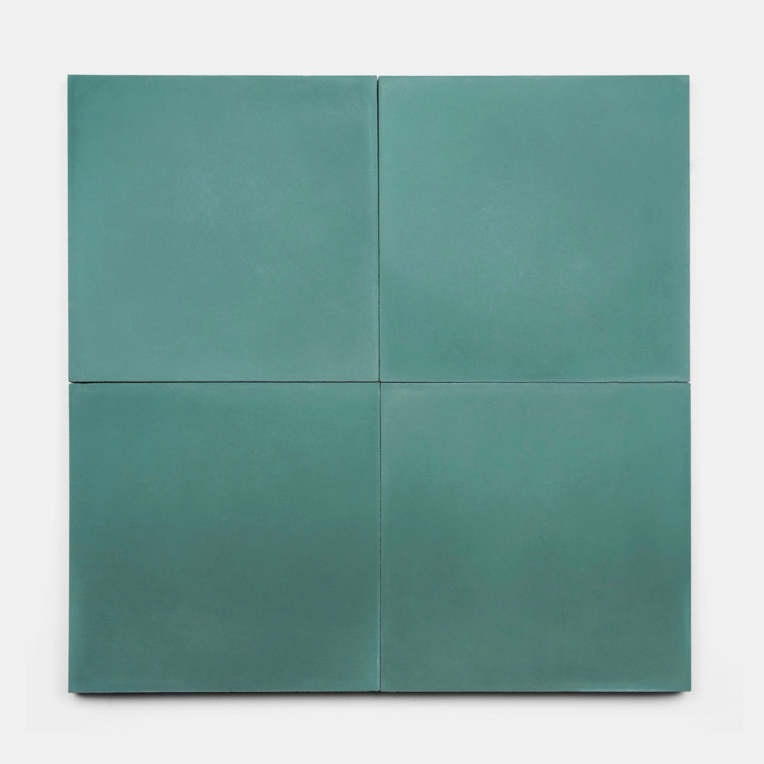 Four Everglade 8x8 matte teal ceramic tiles from vendor-unknown are arranged in a 2-by-2 grid on a white background. These smooth, gradient tiles with clean edges are perfect for kitchen backsplashes.