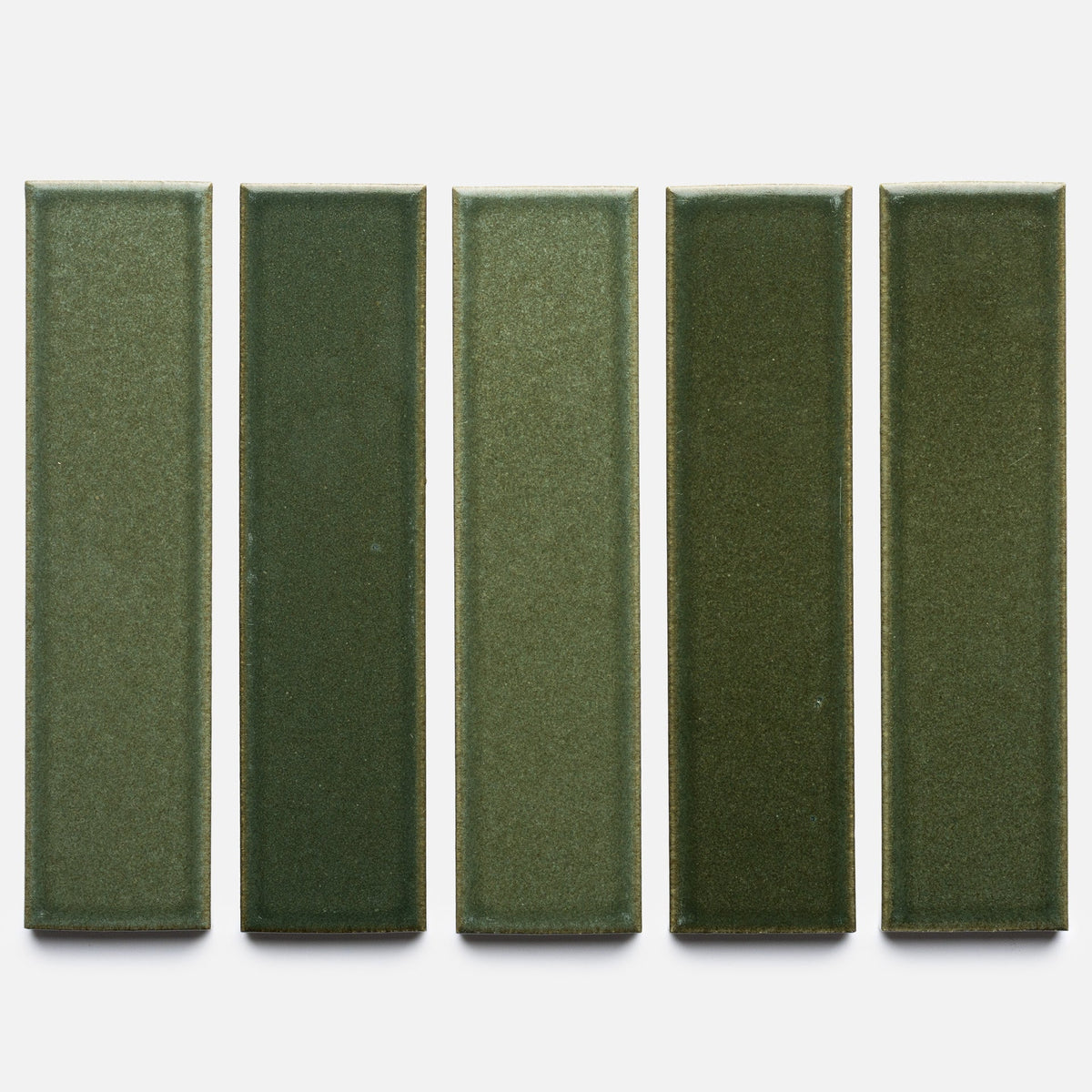 Five rectangular Frogtown + Flat, Sample tiles by Zia Tile are arranged vertically on a white background, each showing subtle differences in green shade and texture.