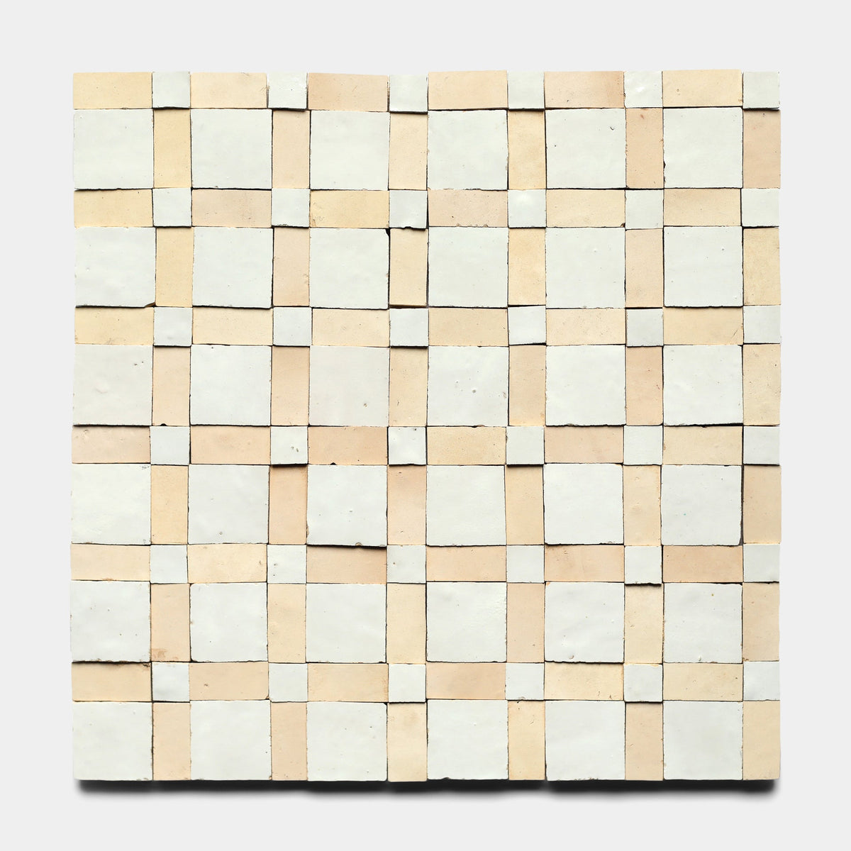 A square grid artwork featuring Gambit 2, Sample by Zia Tile—alternating beige and off-white rectangles in a woven checkerboard pattern with subtle texture, handmade edges, and a plain light gray background.