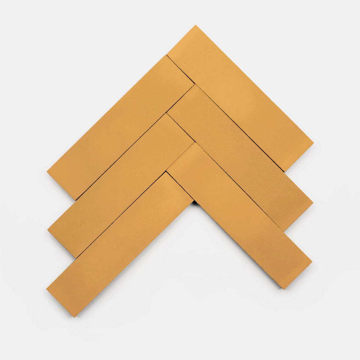 Five rectangular Ginger 2x8 samples by vendor-unknown arranged in a herringbone pattern on a white background, forming an upward-pointing arrow shape.