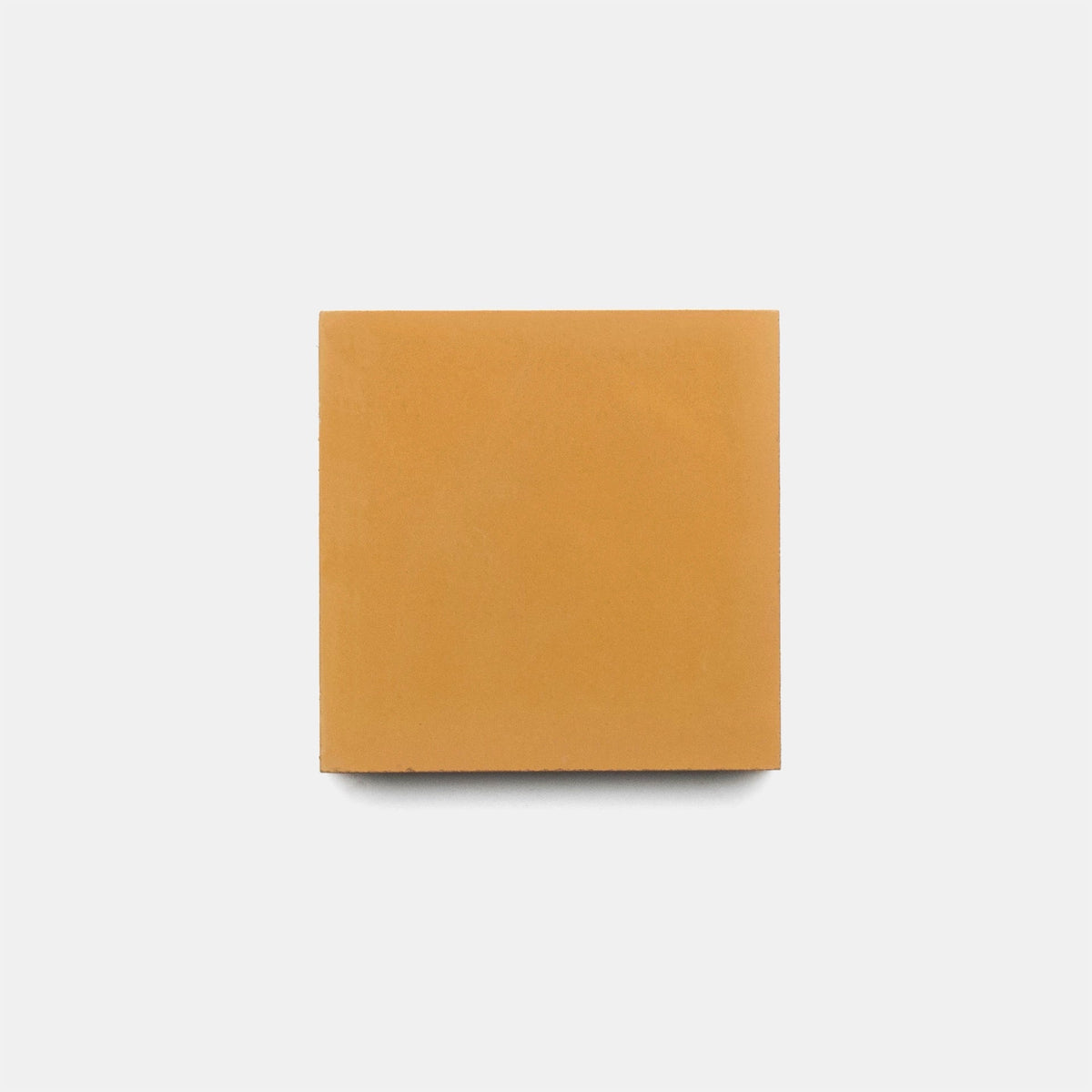 A single Ginger 4x4 sample tile by vendor-unknown, solid and light brown, is centered on a plain white background.