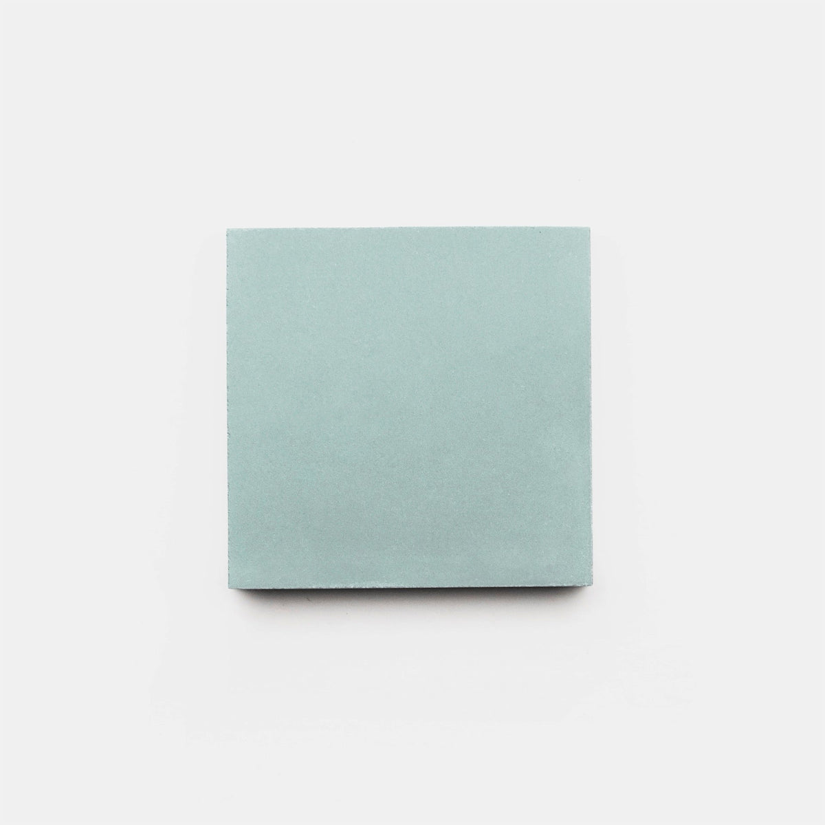 A single Hailstone 4x4 Sample tile from vendor-unknown, square-shaped and light blue, is centered on a plain white background, evoking the clean simplicity of a handmade tile.