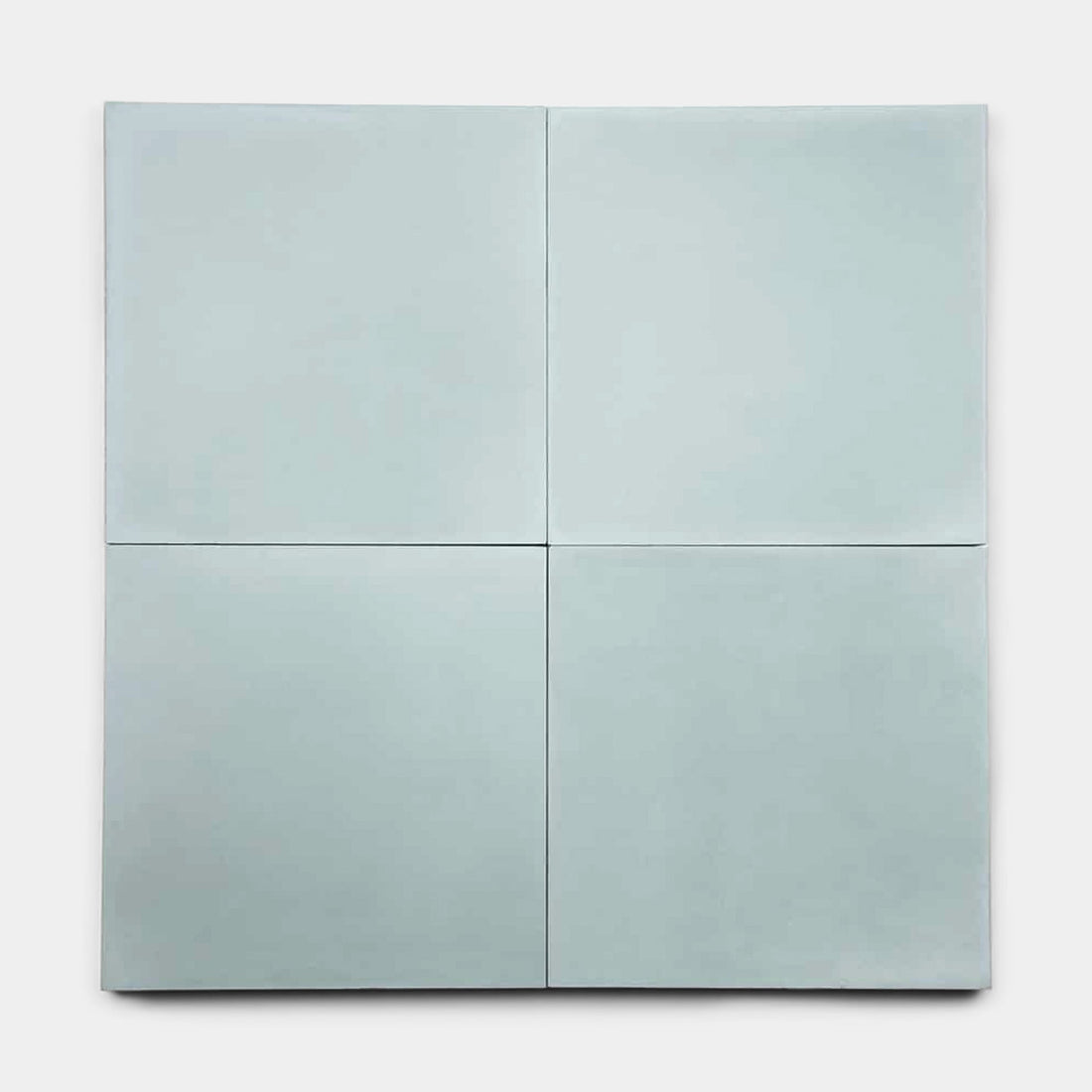 The Hailstone 8x8 by vendor-unknown features four light gray, smooth cement-style tiles in a 2x2 grid on white. Narrow gaps form a subtle cross at the center—ideal inspiration for a minimalist kitchen backsplash.