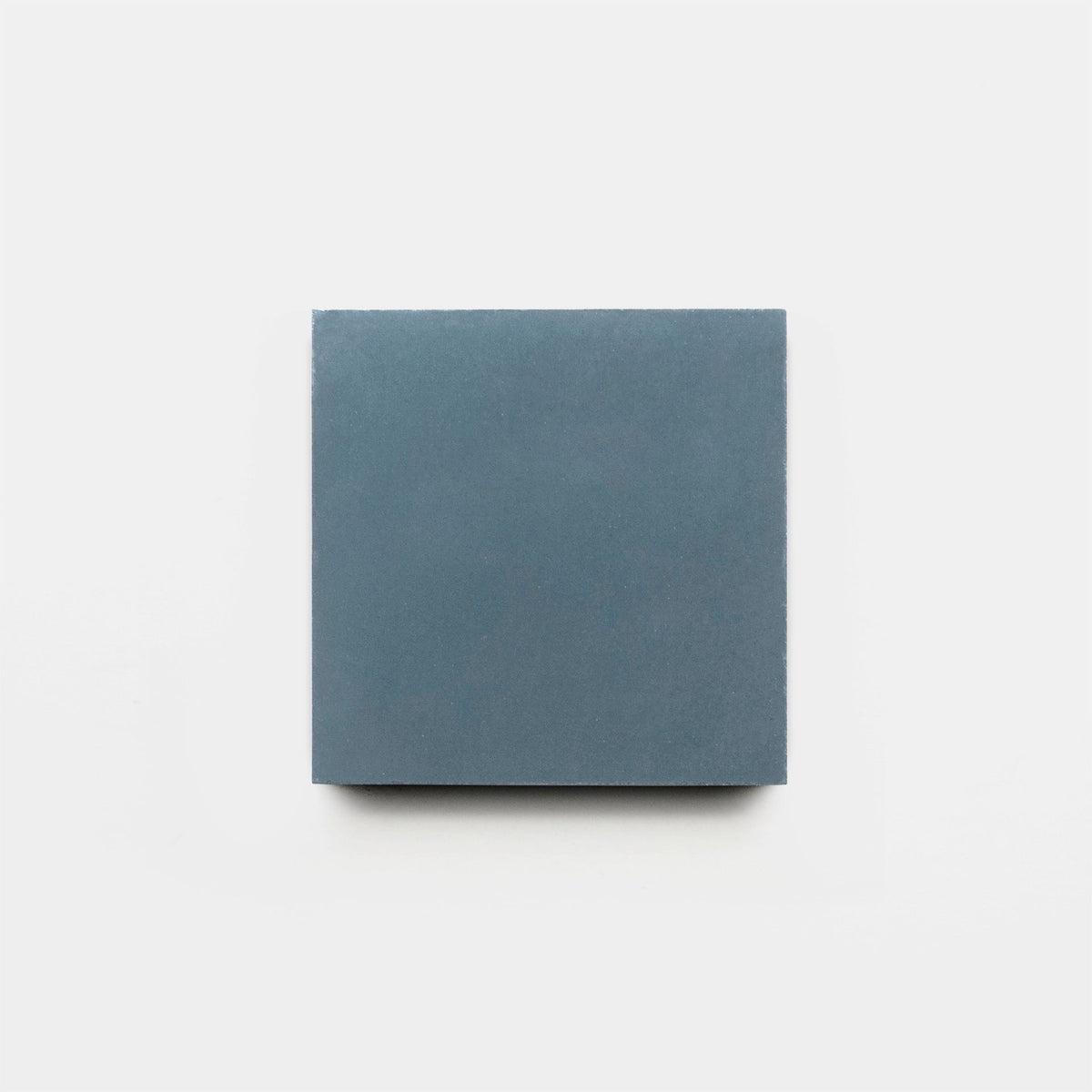 A single Hyannis 4x4 sample tile by vendor-unknown, in a solid matte blue finish, is centered on a plain white background.