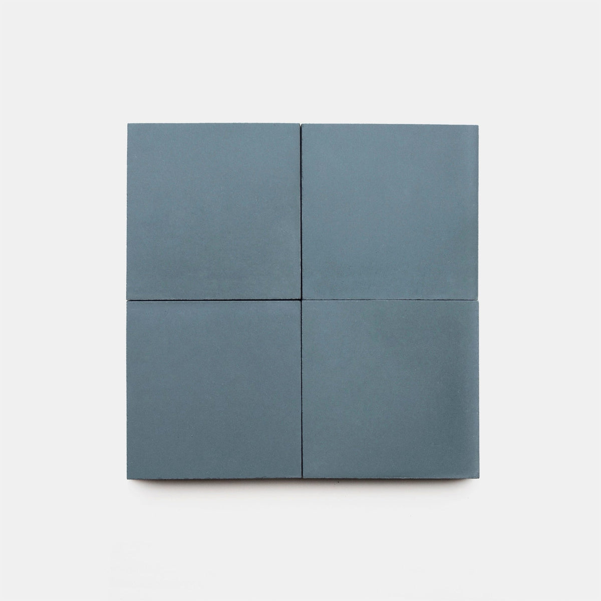 Four Hyannis 4x4 samples from vendor-unknown, dark blue cement tiles, arranged in a 2x2 grid on a plain white background.
