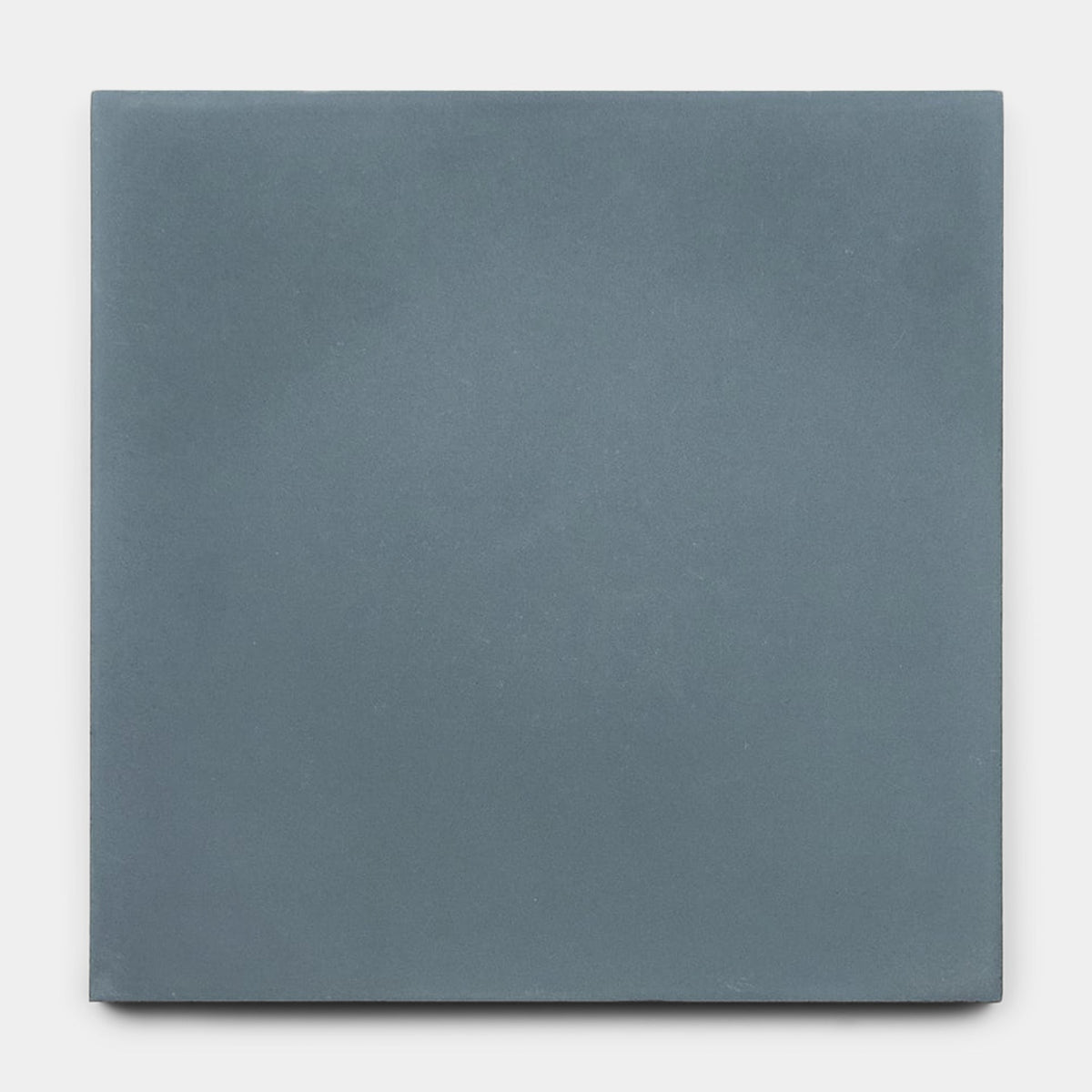 The Hyannis 8x8 Sample by vendor-unknown is a matte, square blue-gray tile with a smooth surface and slightly rounded edges, shown against a light gray background.