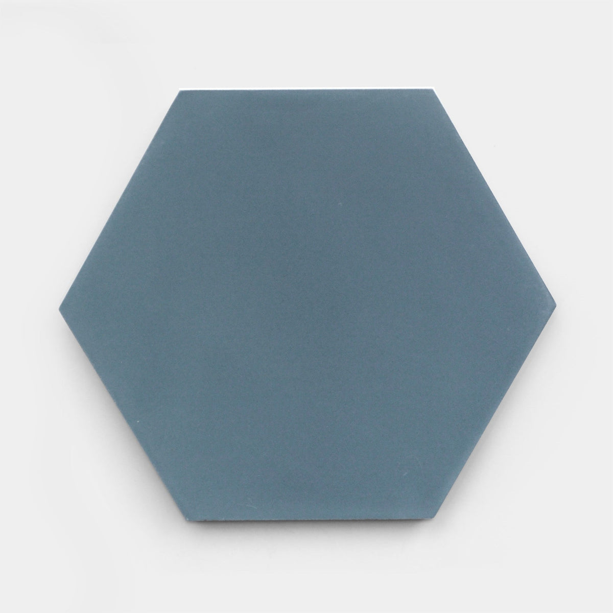 The Hyannis Hex, Sample by vendor-unknown is a handmade matte slate blue hexagonal cement tile with a solid color, shown against a white background.