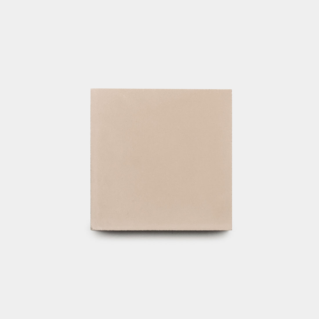 The Jaipur Pink 4x4 cement tile by vendor-unknown is a square, beige tile displayed on a white background—ideal for a minimalist kitchen backsplash.