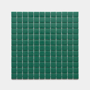 The Jasper 1x1 Sample by Zia Tile features a grid of small, square, green tiles arranged evenly on a white background.