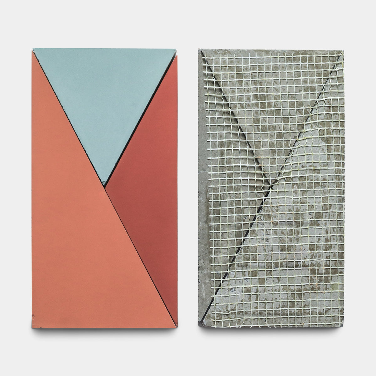 Kepler Set One, Sample by Zia Tile showcases two rectangular tiles: the left has blue and reddish-orange geometric shapes, while the right displays a rough cement surface with a mesh grid and diagonal lines, both on a white background.