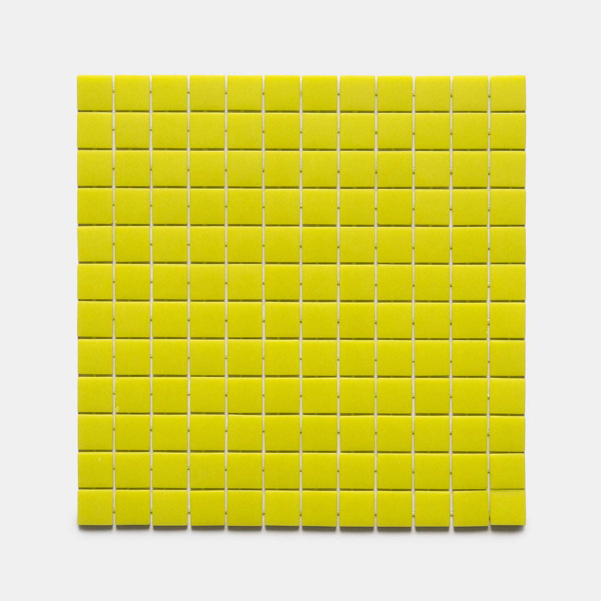 A grid of Kiwi 1x1 yellow tiles by Zia Tile, neatly arranged against a white background.