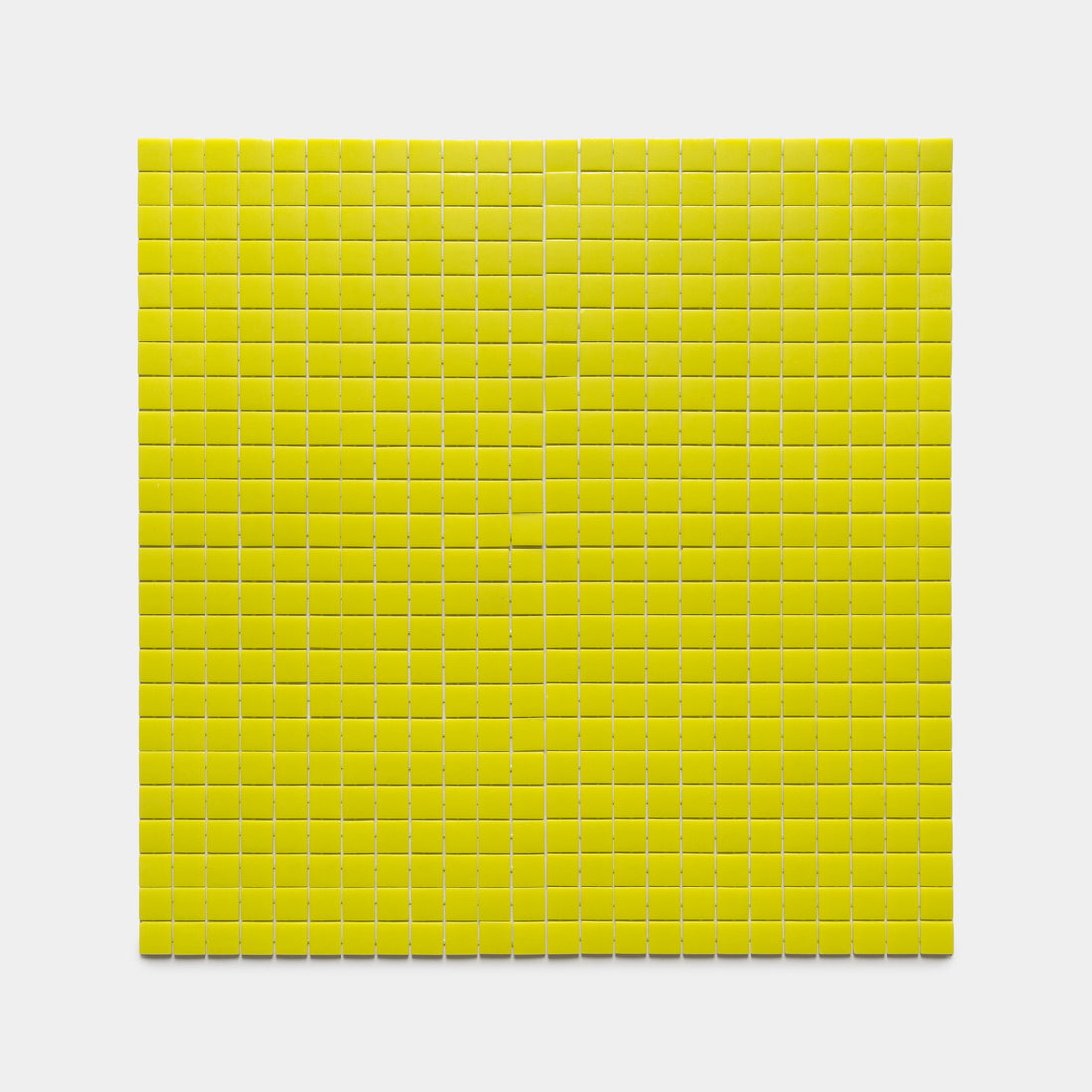 A tight square grid of evenly spaced Kiwi 1x1 yellow tiles by Zia Tile displayed on a white background.