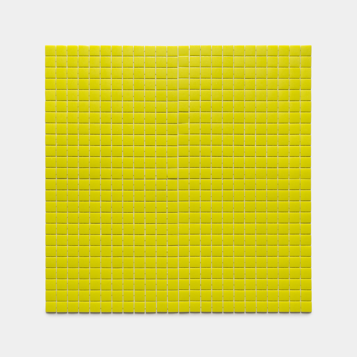 A tight square grid of evenly spaced Kiwi 1x1 yellow tiles by Zia Tile displayed on a white background.