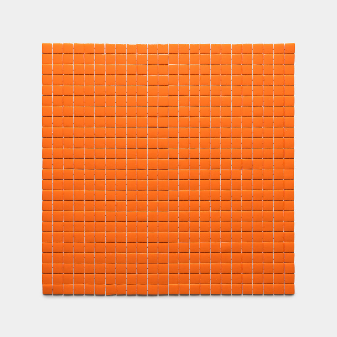 A square grid of Zia Tile Kumquat 1x1 orange cubes, evenly spaced in rows and columns on a plain white background.