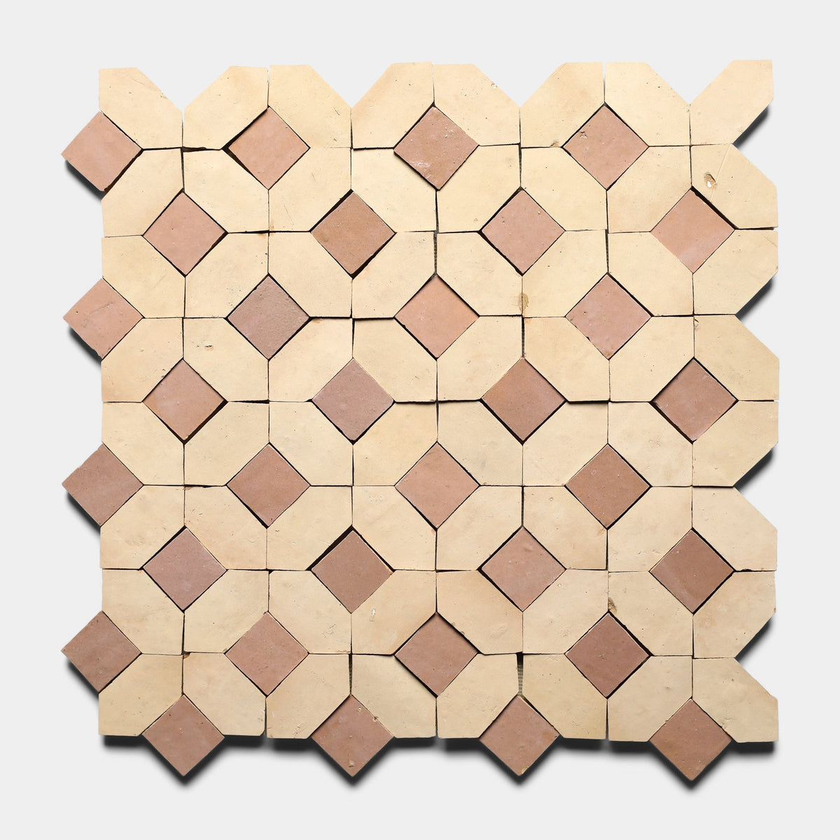 Lattice 2, Sample by Zia Tile features a square cement tile with alternating tan octagons and small brown diamonds at the intersections, forming a geometric lattice pattern on a light gray background.