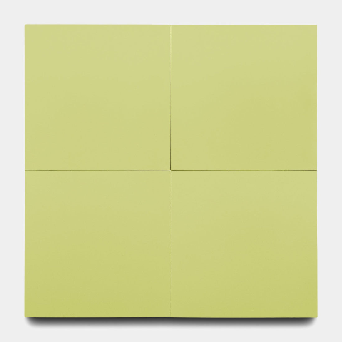 Lemongrass 8x8 by Zia Tile features a square design with four equal light yellow-green quadrants, creating a minimal geometric look on a white background inspired by classic Zia Tile patterns.