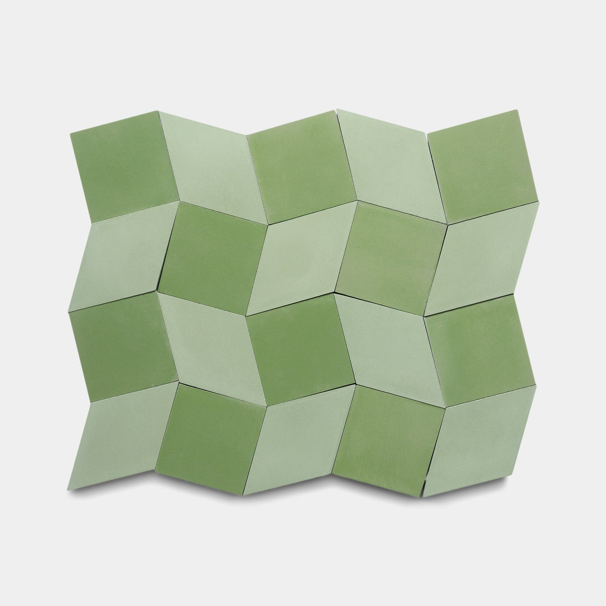 Twelve Madrid Olivine + Nile tiles by Zia Tile are arranged in a pattern to form a 3D optical illusion of cubes on a white background.