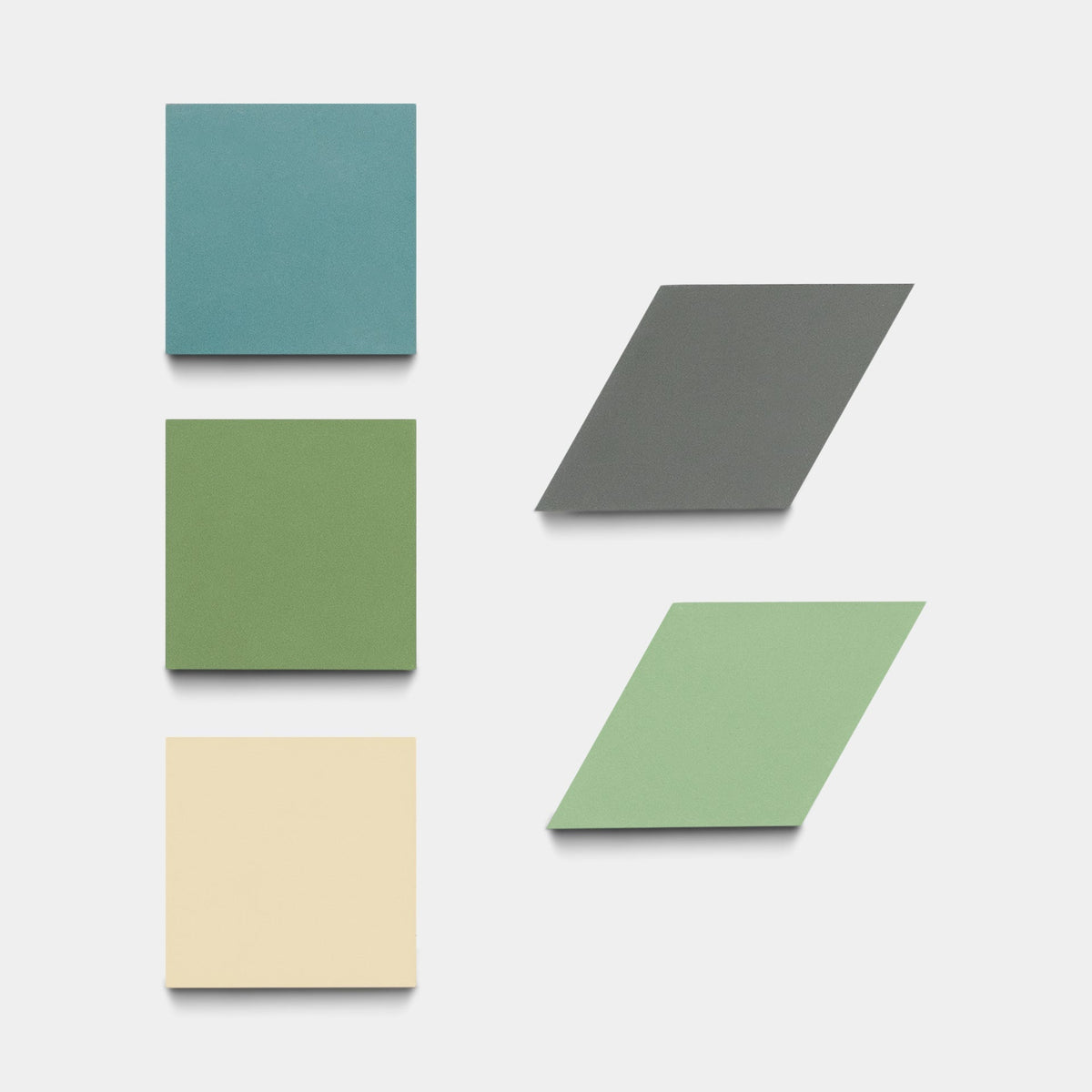 The Madrid Set Four, Sample by Zia Tile features four colored squares (teal, green, cream, and gray) vertically on the left and two parallelograms (gray and light green) diagonally on the right, all on a white background.