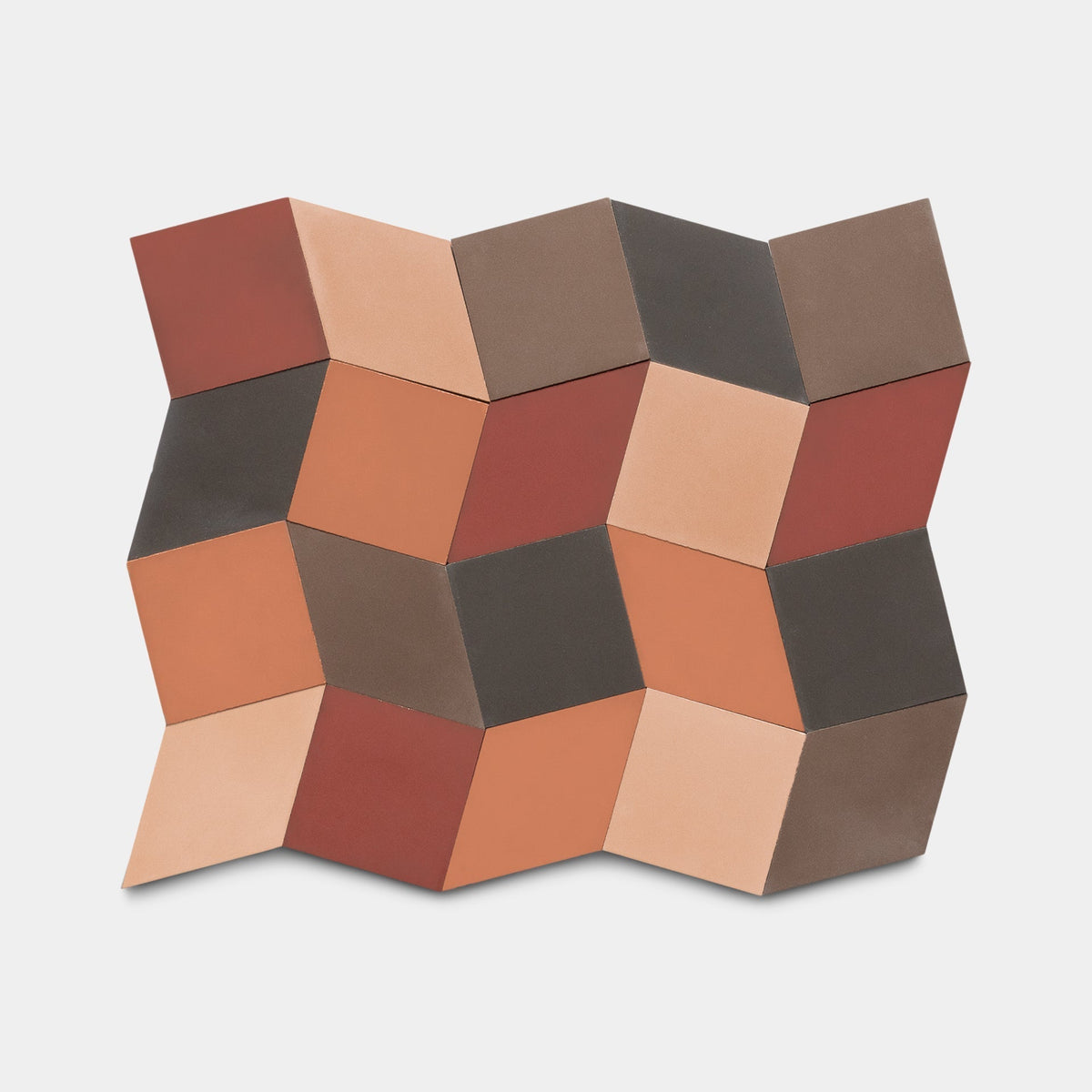 The Madrid Set One, Sample by Zia Tile features 3D cube-shaped wall tiles in red, brown, orange, and beige on a white background—ideal for fans of Zia Tile's signature geometric style.