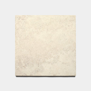The Mesa 12x12 tile by Zia Tile is a square beige Cantera stone tile with a subtle, textured surface and light natural color variations, shown against a plain white background.
