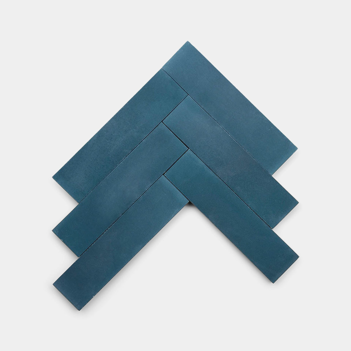Five Midnight 2x8 cement tiles by vendor-unknown are arranged in a herringbone pattern on a white background.