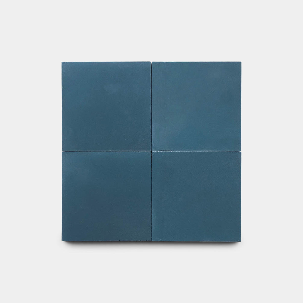 Four matte, square Midnight 4x4 cement tile samples by vendor-unknown are arranged in a two-by-two grid against a plain white background.