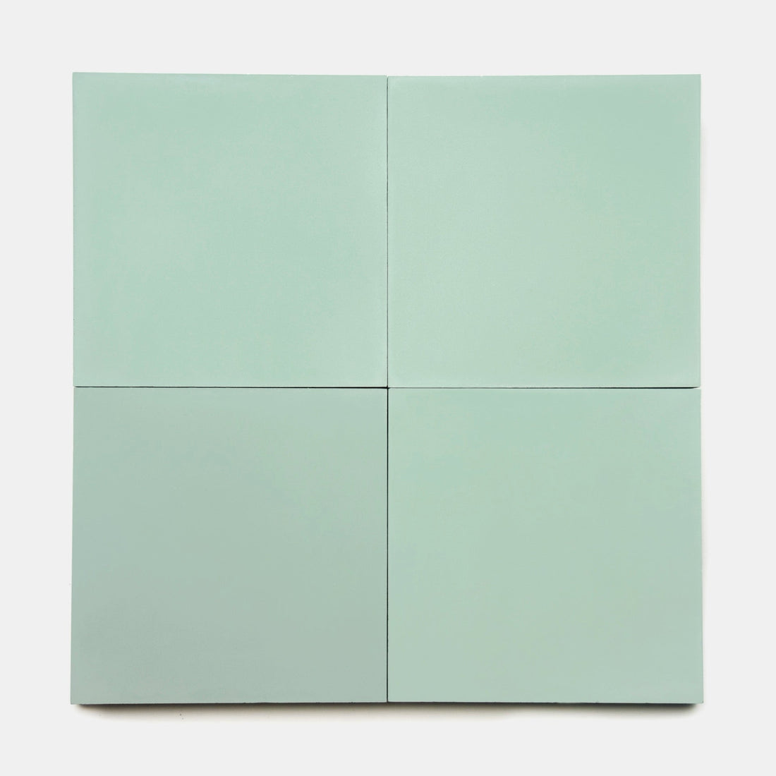 Four vendor-unknown Mint 8x8 pale green cement tiles are arranged in a 2x2 grid on a plain white background.
