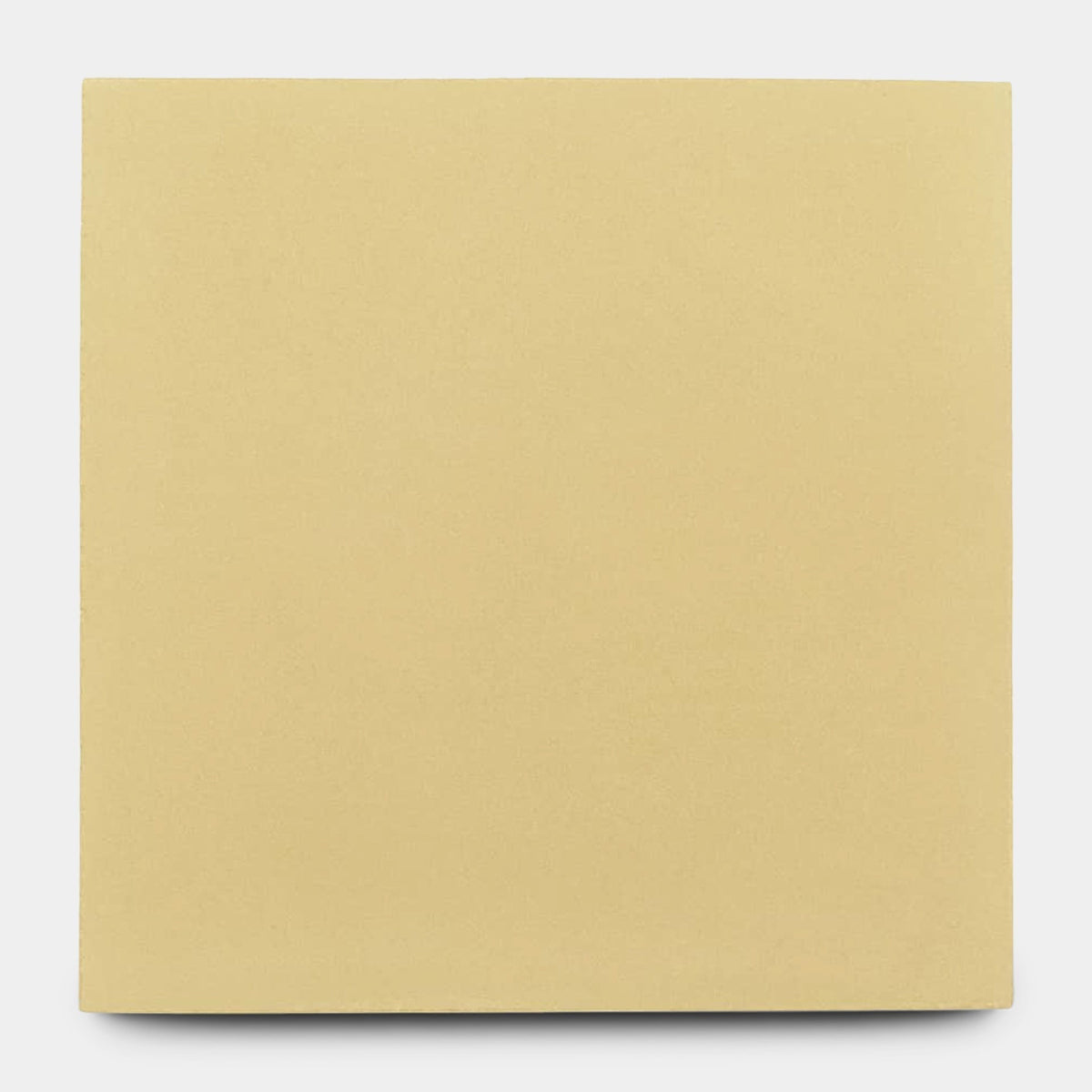 A plain, square sheet of light yellow paper sits centered on a white background, echoing the subtle tones found in vendor-unknown’s Mojave 8x8 sample tile.