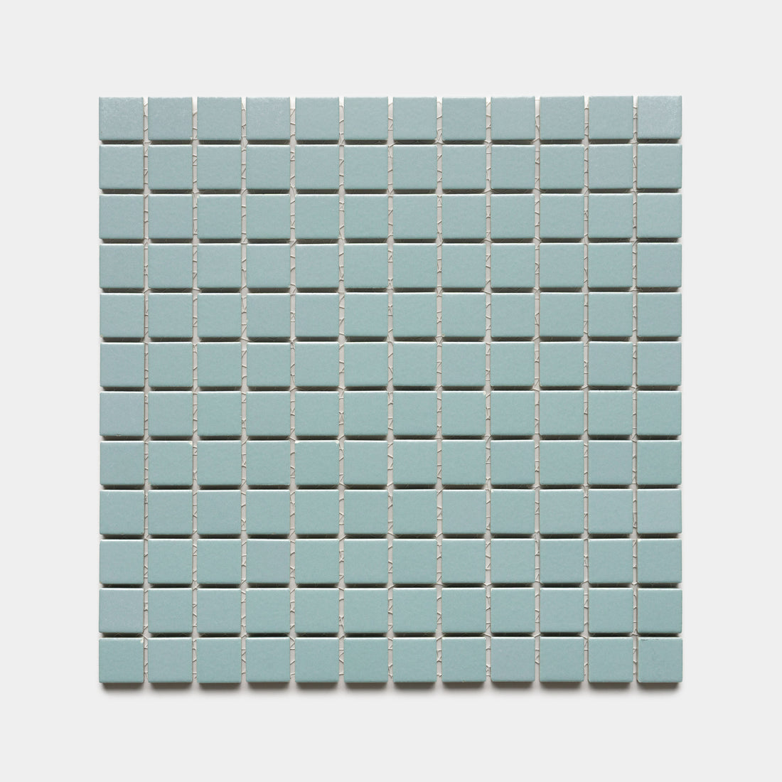 Moonlight 1x1 by Zia Tile features a grid of evenly spaced, light blue square tiles with white grout lines, set against a plain white background.