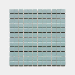 Moonlight 1x1 by Zia Tile features a grid of evenly spaced, light blue square tiles with white grout lines, set against a plain white background.