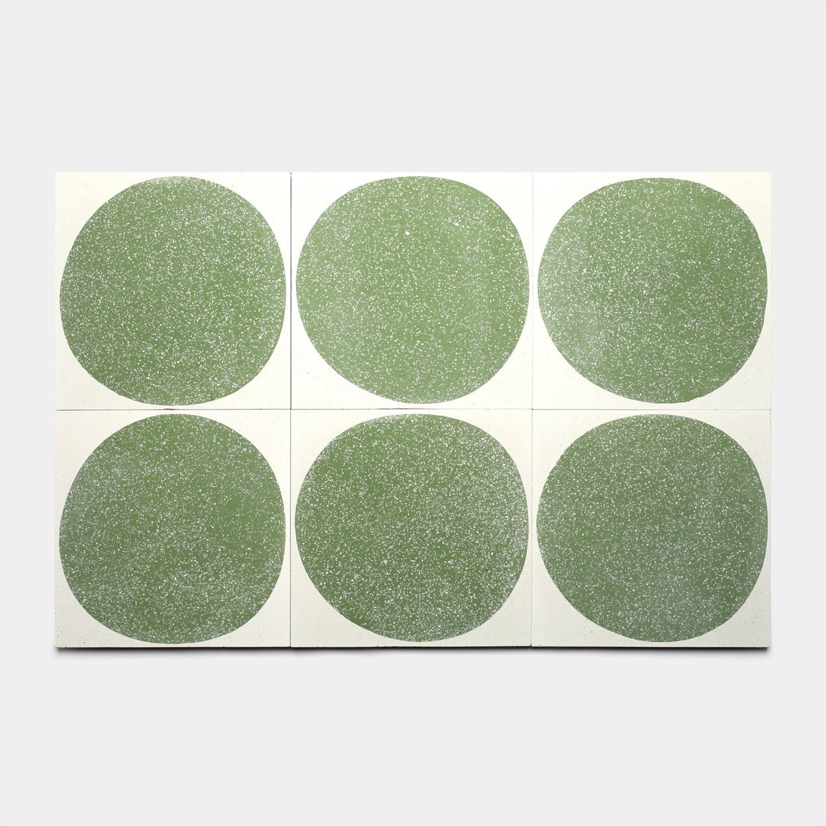 Six Zia Tile Moxie Saguaro 12x12 samples are arranged in two rows of three, each featuring a large, textured green circle with white speckles on a white background.