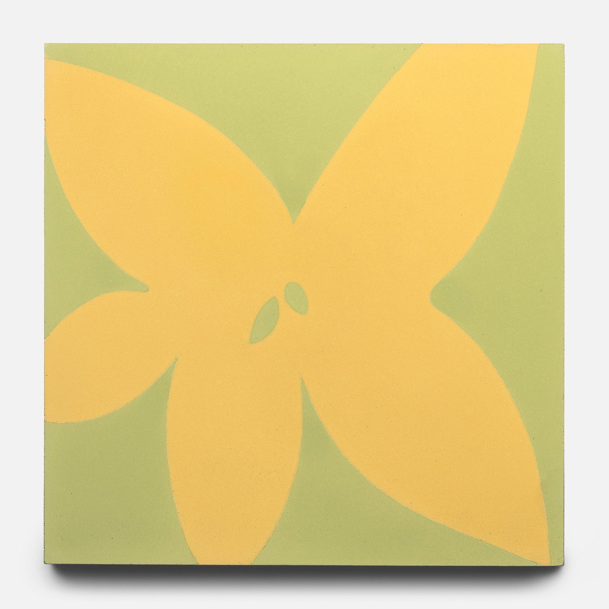 The Flora 8x8 Set Mustard + Lemongrass Sample by Zia Tile showcases a minimalist design with a bold abstract yellow four-petal flower and two center ovals on a muted green background.