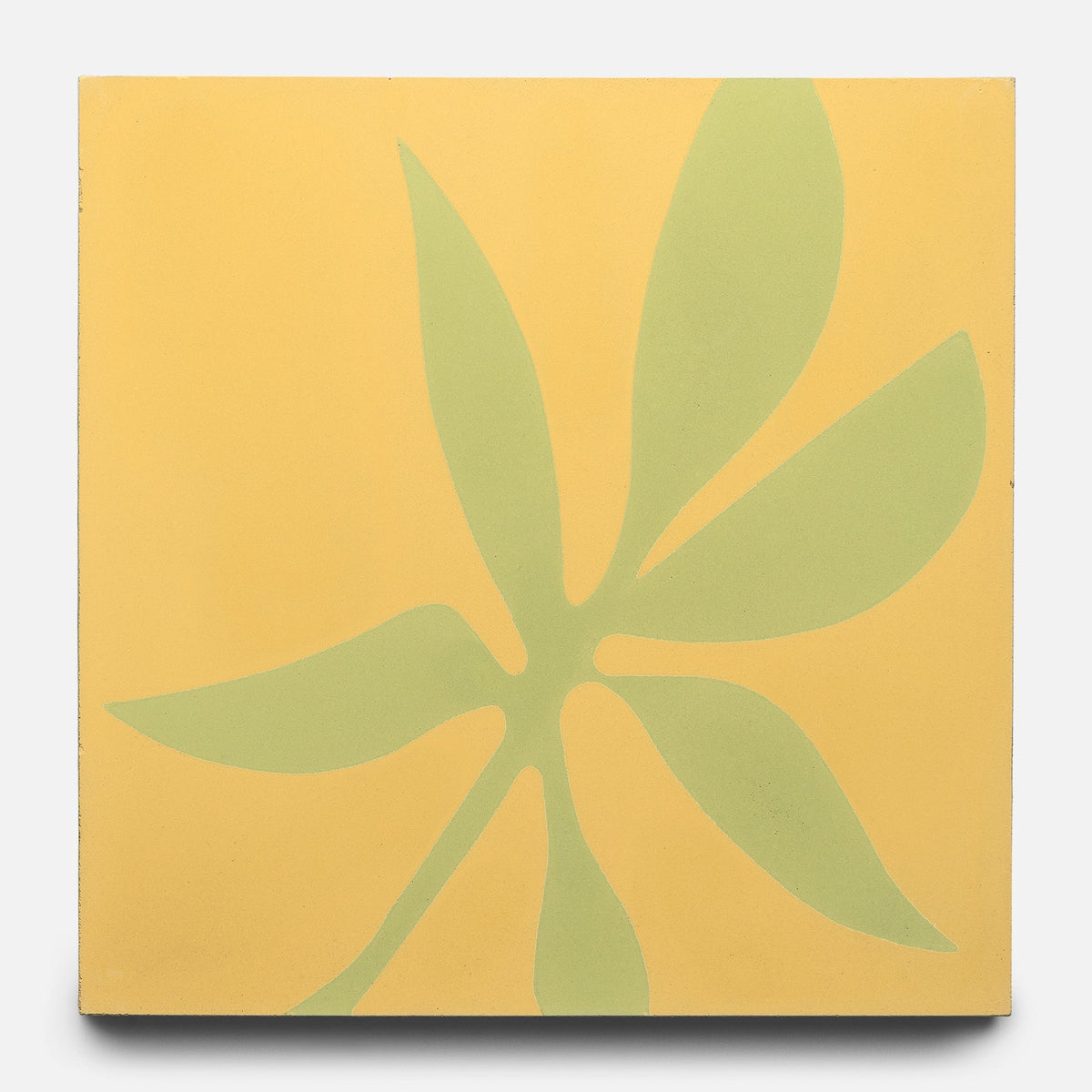 The Flora 8x8 Set Mustard + Lemongrass sample by Zia Tile is a square tile with a yellow background and a minimalist green six-leaf design radiating from the center.