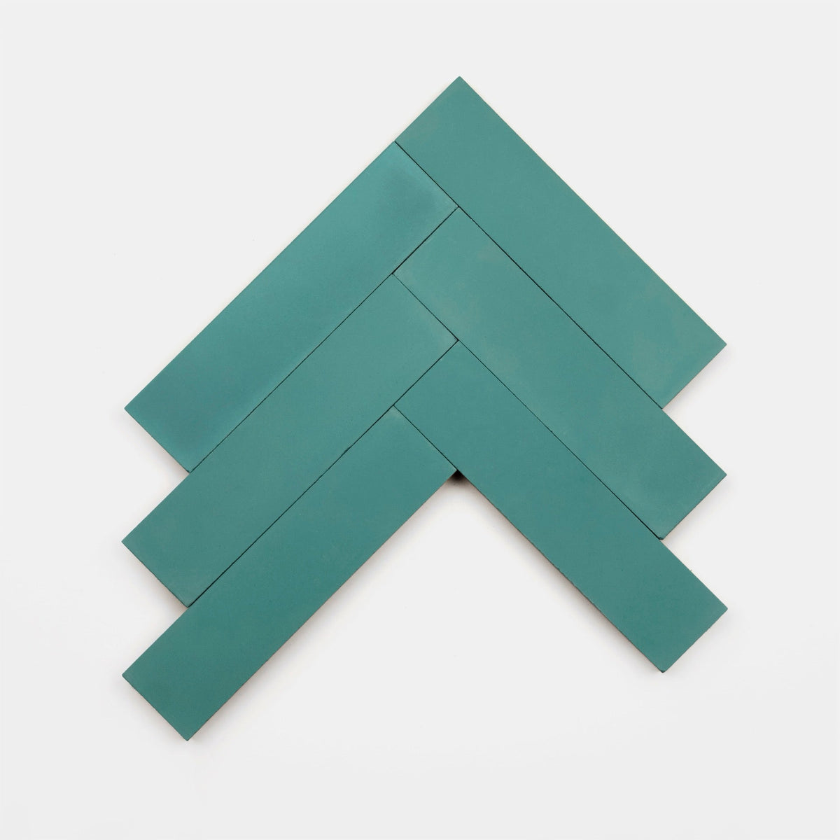 Five Neptune 2x8 sample tiles by vendor-unknown are arranged in a herringbone pattern on a white background, creating an upward-pointing chevron shape.