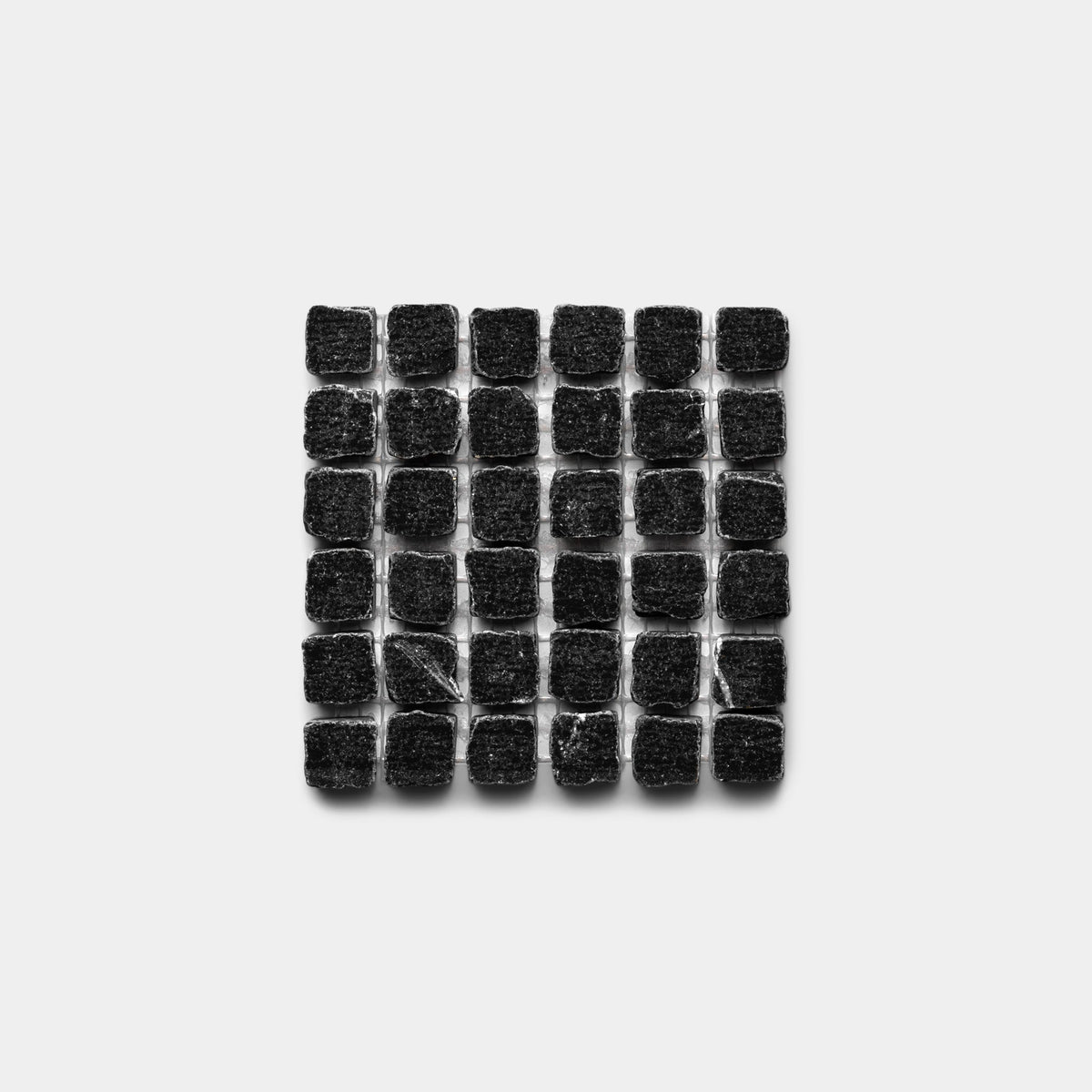 A grid of 36 Nero Marquina 5/8 samples by Zia Tile, arranged in six rows and six columns on a plain white background.