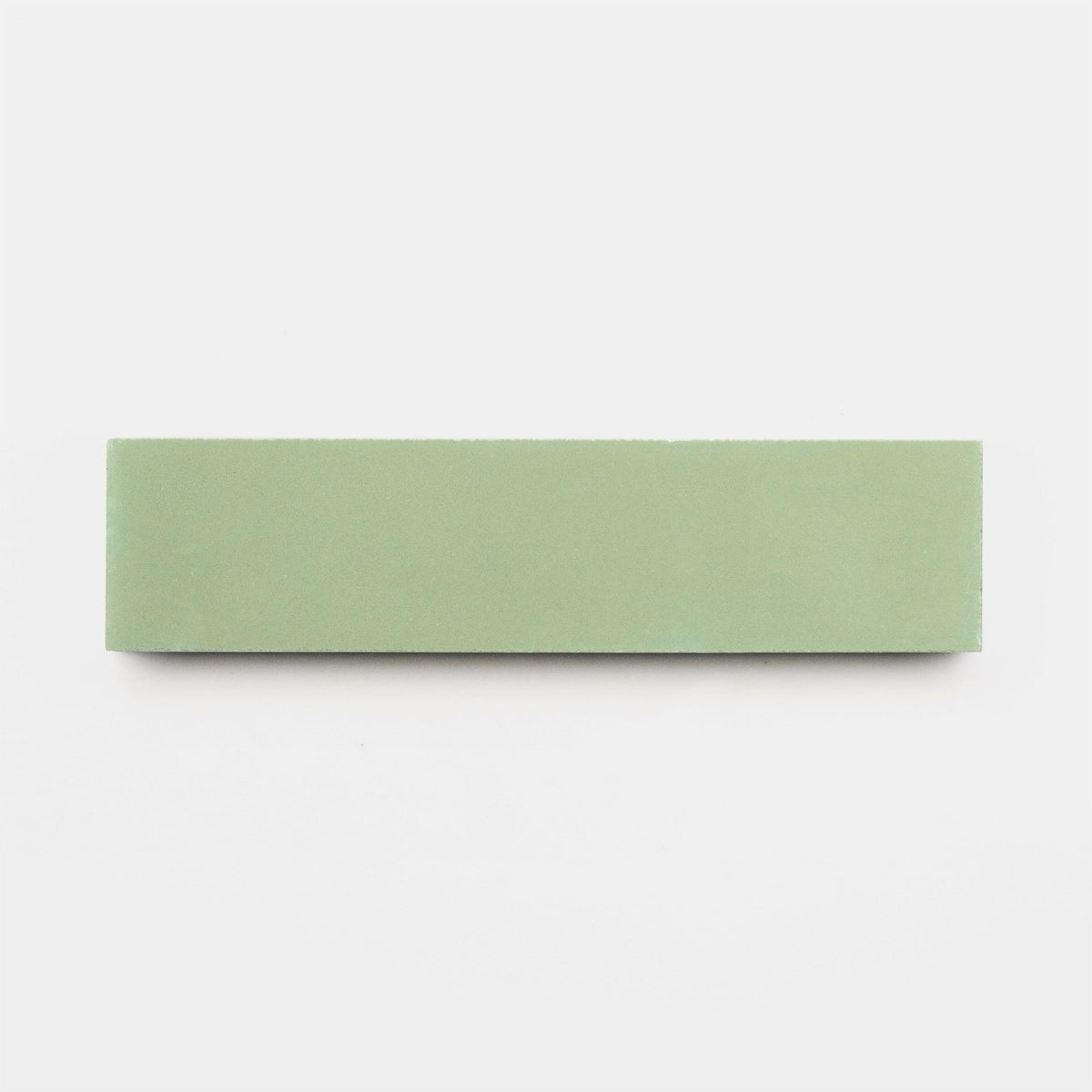 A rectangular green tile sample, Dune 2x8 from Zia Tile, is displayed on a plain white background.