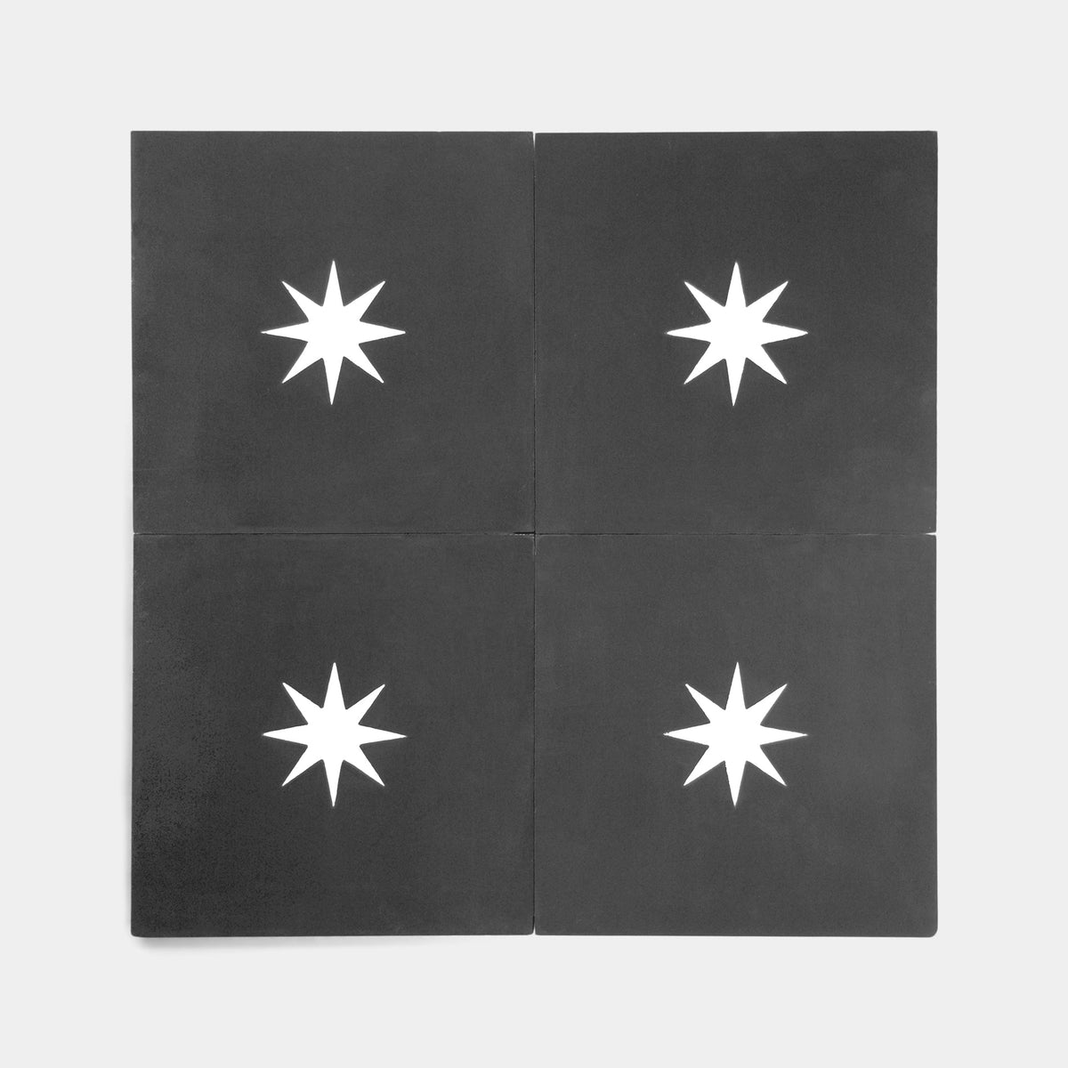 Four Nova Black 8x8 tiles from vendor-unknown, each with a central white eight-pointed star, are arranged in a grid on a plain white background.