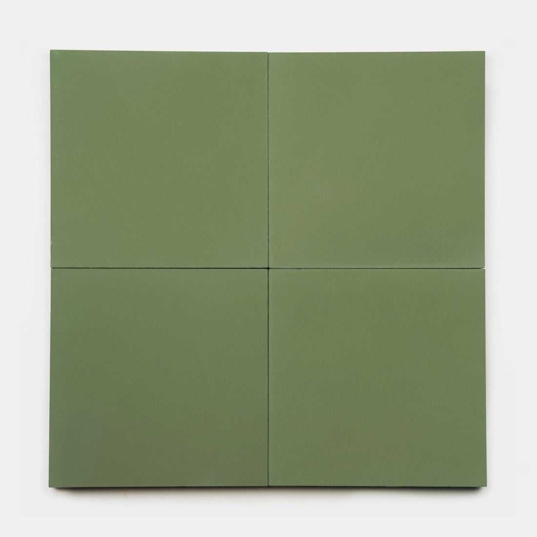 Four Olivine 8x8 cement tiles by vendor-unknown are arranged in a two-by-two grid on a white background. Each tile has a smooth, matte finish and subtle sage green color variation.