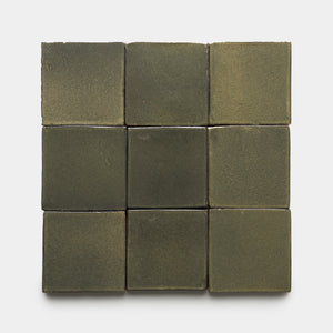 Nine Oyamel 4x4 Square ceramic tiles by Zia Tile, in olive green matte finish with slightly uneven, handmade-style surfaces, are arranged in a 3-by-3 grid on a white background.