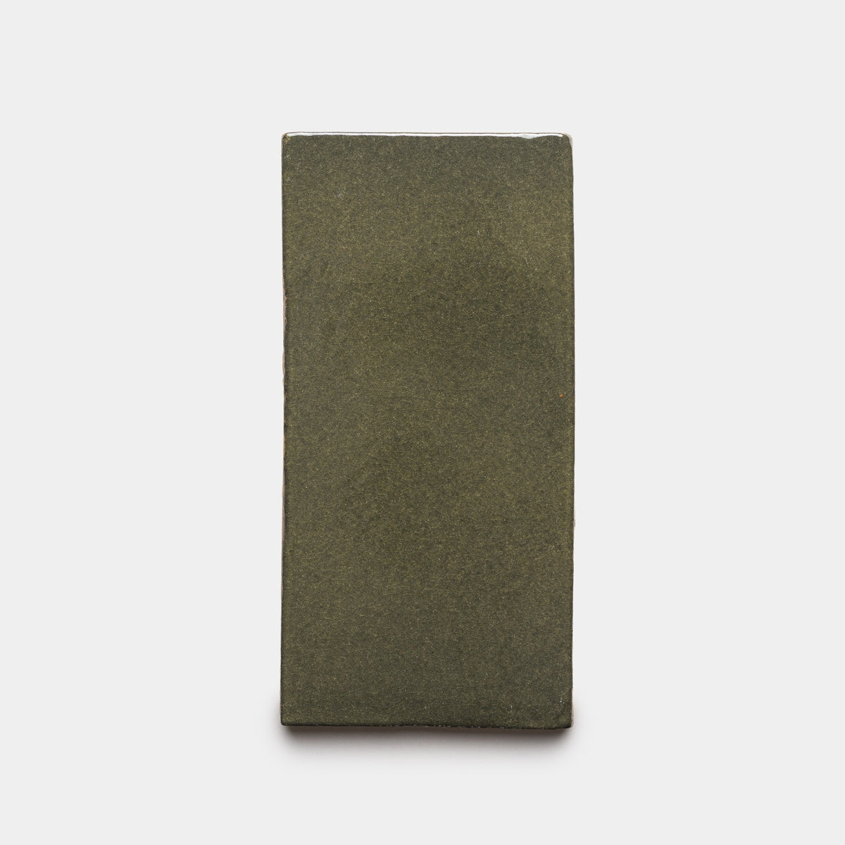 The Oyamel 4x8 Rectangle by Zia Tile is a rectangular, olive-green stone slab with a smooth surface, displayed upright against a plain white background.