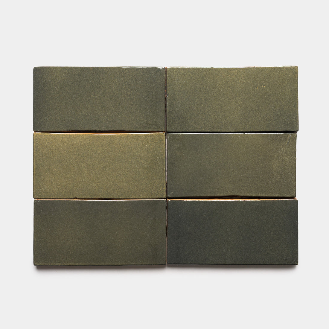 Six Oyamel 4x8 Rectangle tiles by Zia Tile, each with a matte olive green finish, are arranged in two rows of three on a plain white background.