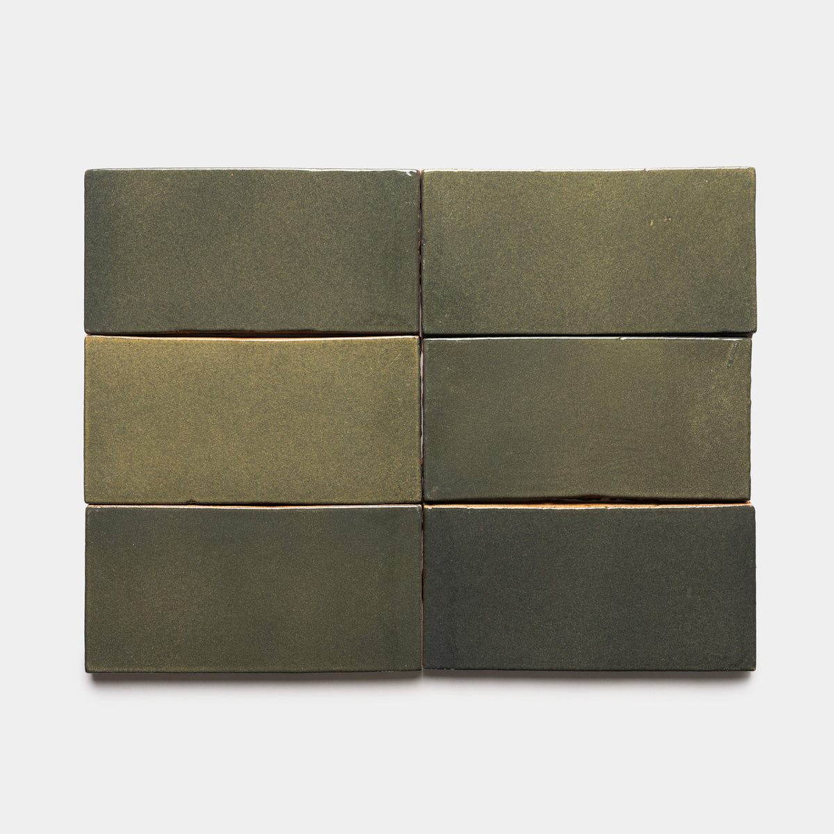 Six Oyamel 4x8 Rectangle tiles by Zia Tile, each with a matte olive green finish, are arranged in two rows of three on a plain white background.