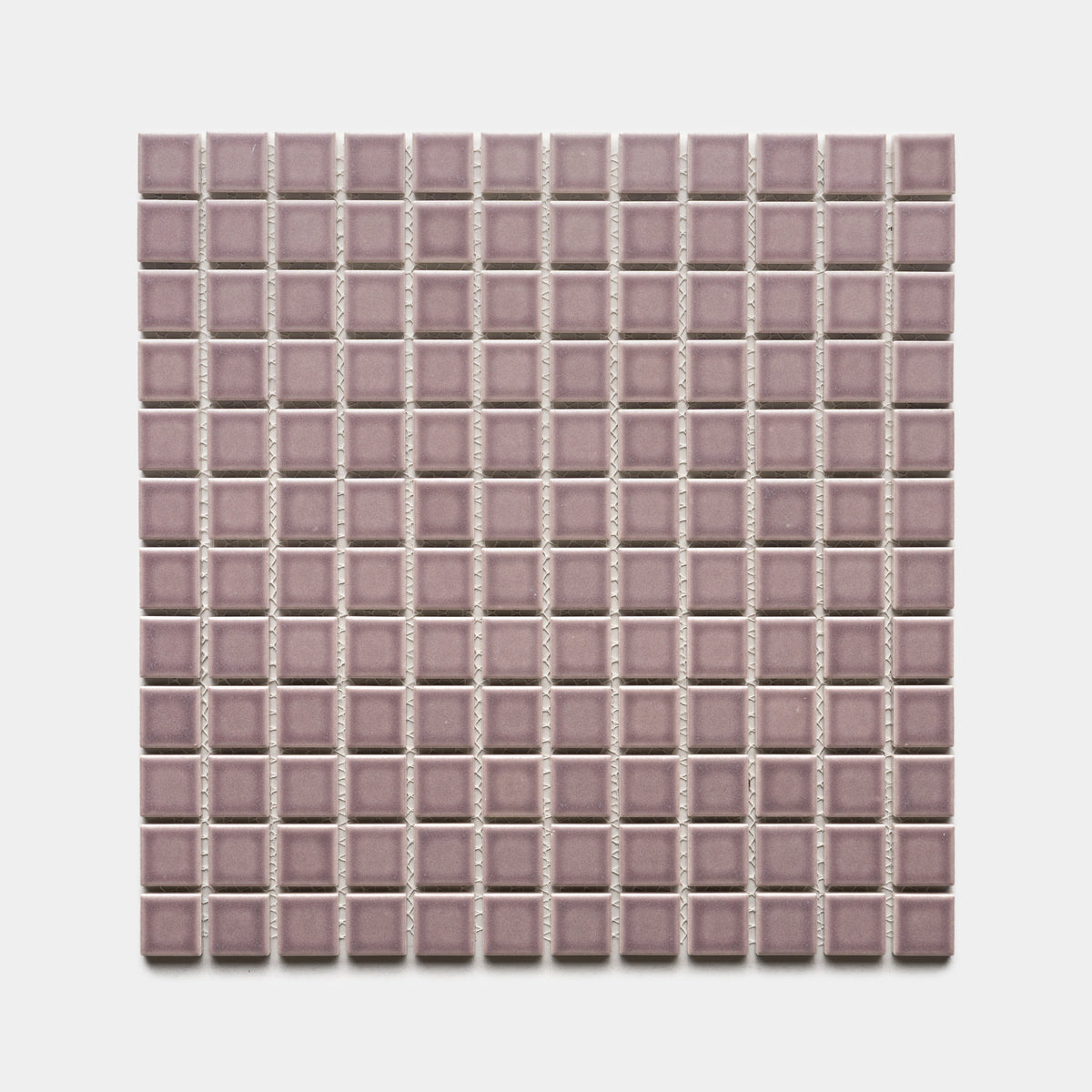 A square sheet of Zia Tile Patchouli 1x1 small, glossy mosaic tiles in mauve, arranged in a grid pattern on a white background.