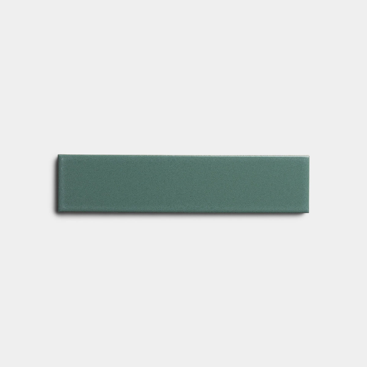 A single Patina 2x8 ceramic tile sample by Zia Tile, featuring a matte, muted green finish, is centered on a plain white background.