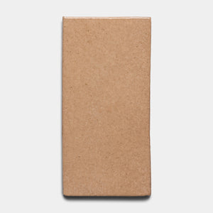 The Posada 4x8 Rectangle by Zia Tile is a rectangular, light brown bar with a smooth surface, displayed against a plain white background.